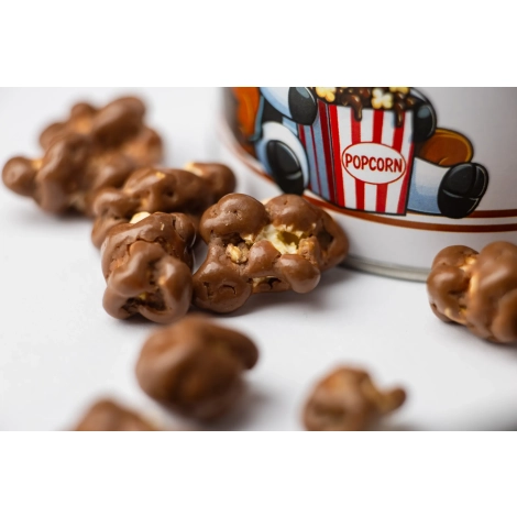 Popcorn w czekoladzie w opakowaniu skarbonce